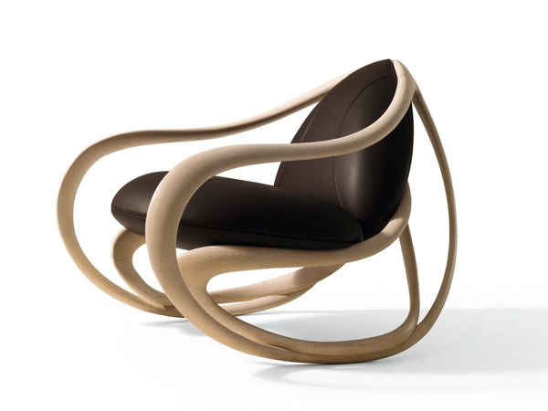 Experience Elegance and Comfort with Rossella Pugliatti's Rocking Armchair!